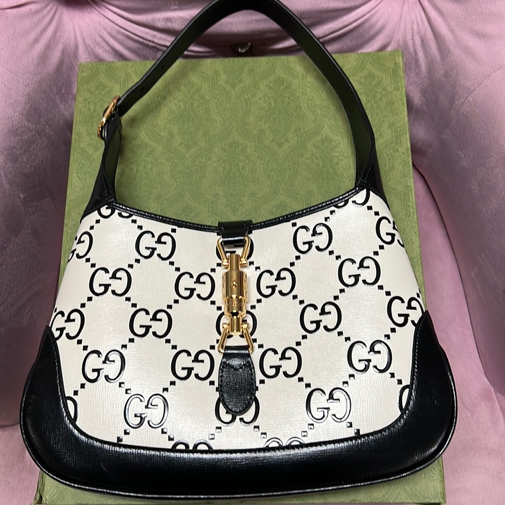 Gorg Gucci black and white bag with gold buckle